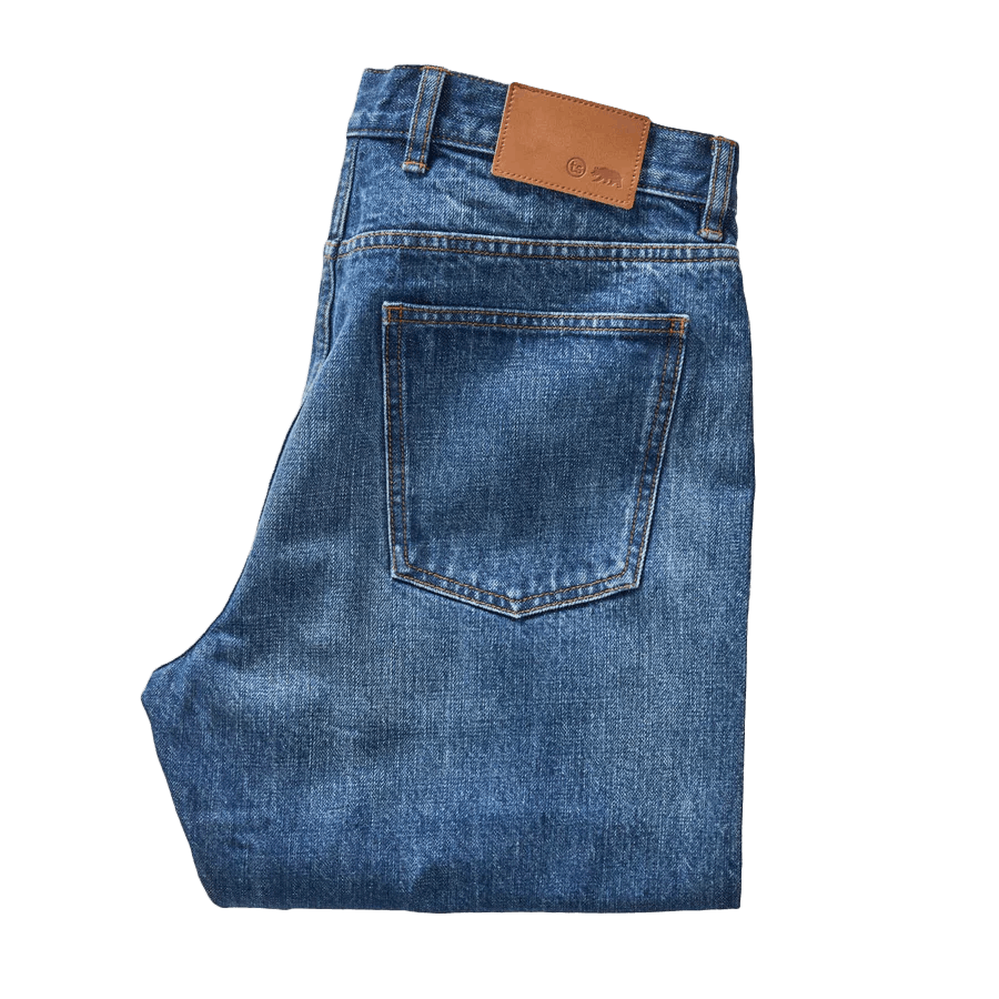 pair of folded jeans